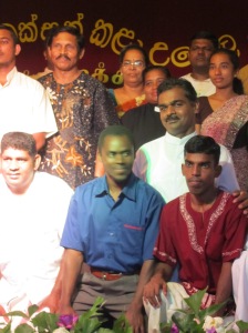 students posing for a photo after a performance on Cultural Day